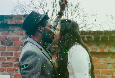 foreign man and woman kissing